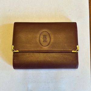 Cartier Bordeaux leather kisslock trifold wallet